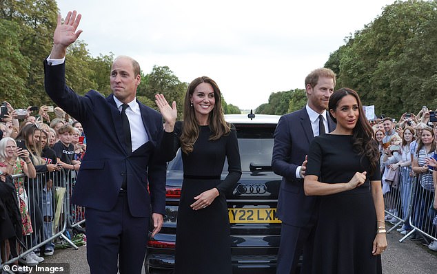 The group wave to crowds lining the Long Walk on September 10, 2022