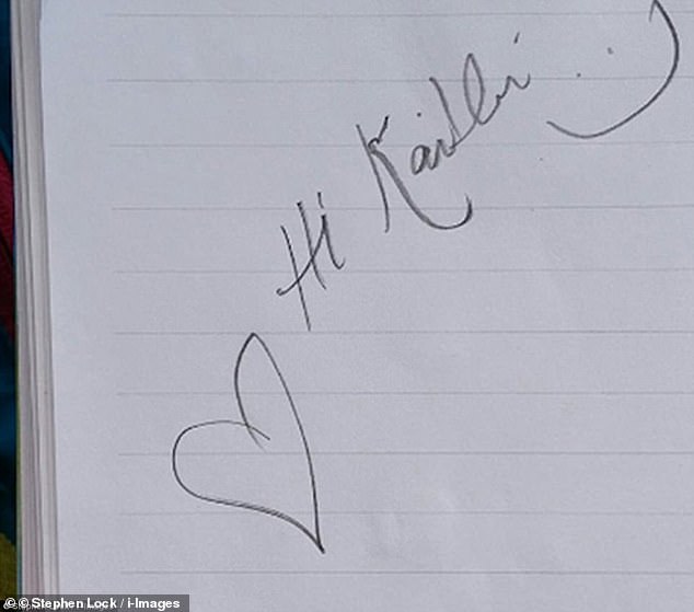 Meghan, then 36, broke the normal rules of royal behaviour when she wrote in a schoolgirl's notebook, as royal autograph hunters normally go away empty-handed. She wrote 'Hi Kaitlin' - albeit misspelt with a K instead of a C - and added a heart and a smiley face