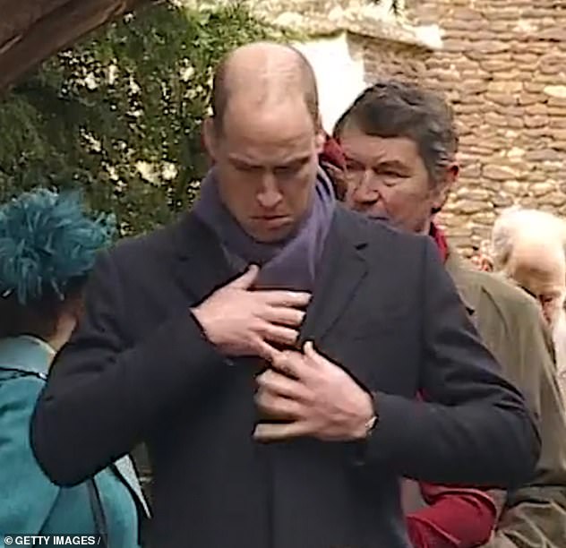 William spent time tucking his scarf into his jacket on Christmas Day in 2018