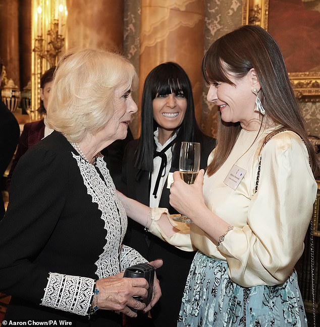 Queen Camilla speaks to actress Emily Mortimer during a reception at Buckingham Palace in November 2024