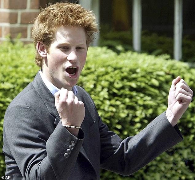 Prince Harry punches the air on his final day at Eton on June 12, 2003