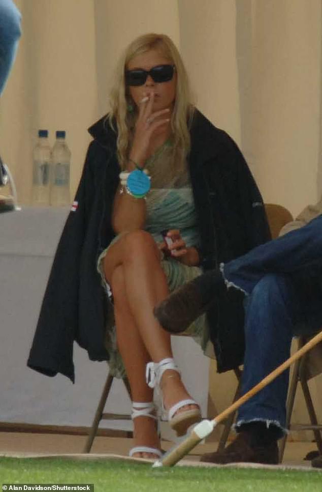 Chelsy smokes at the Cartier International polo Final in Berkshire in July 2006