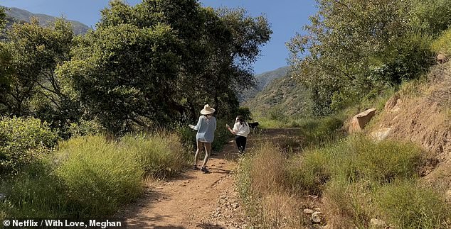 The pals were seen dancing together as they made their way across the mountain trail