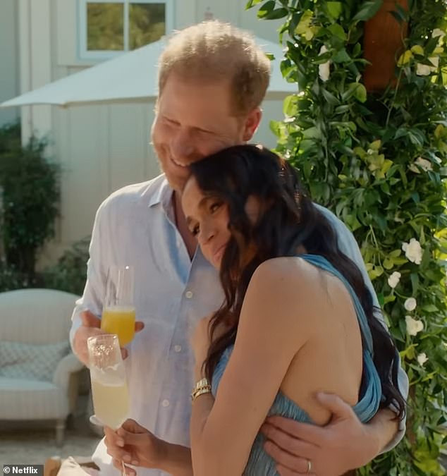 The Duke and Duchess pack on the PDA as they admire the spread with drinks in hand