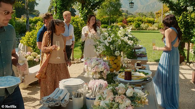 Wearing a pale blue sundress, Meghan thanks her friends and family for attending her brunch