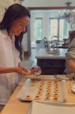 'But the good news is we don't have to make tons because I made a lot for you on Sunday,' Meghan shared as a video that showed her making the cookies started to play