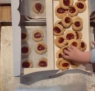 Later on, some little hands were also seen grabbing some of the finished cookies from the boxes