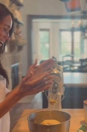 Meghan is seen making the cookies