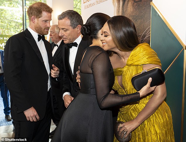 In contrast, Meghan is seen enthusiastically hugging Beyonce back in 2019