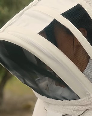 In a clip from Meghan's Netflix show, she is shown in a full beekeepers' outfit as she gathers honey