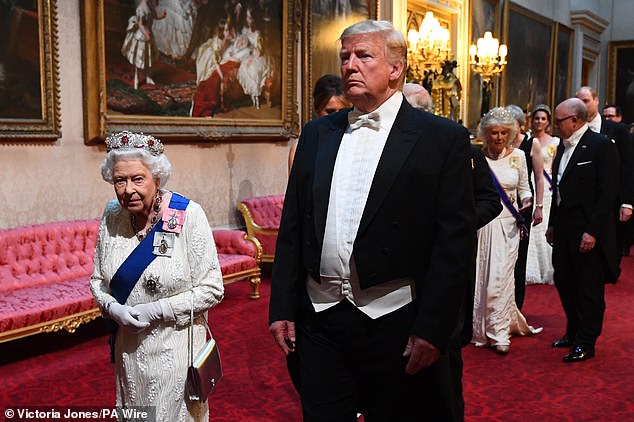 The Queen leads President Donald Trump to a State banquet at Buckingham Palace in 2019