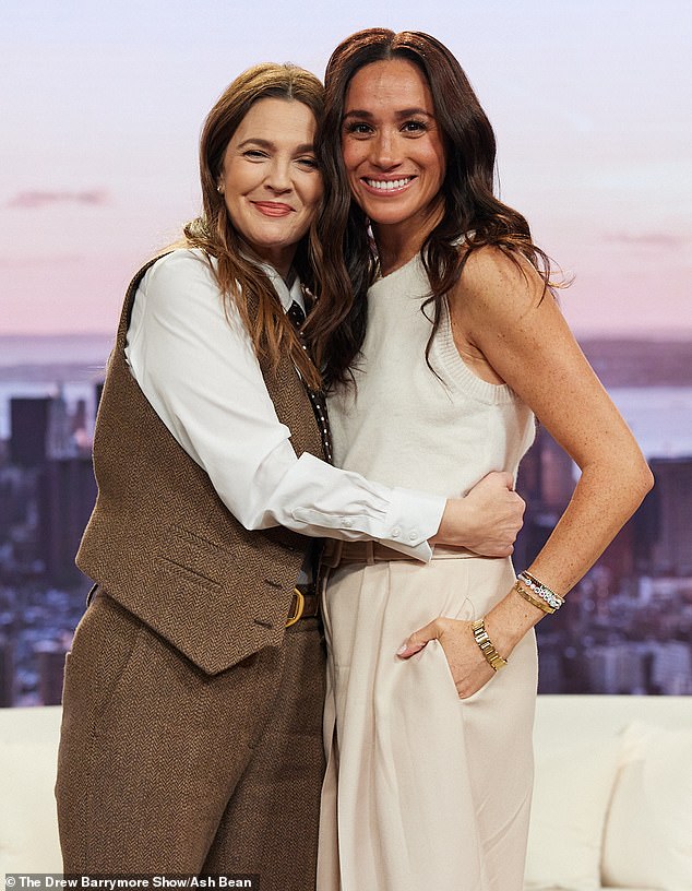 Viewers of the Drew Barrymore show have branded the talk show host 'clingy' and claimed she 'doesn't respect personal boundaries' during an interview with her guest Meghan Markle (pictured together)