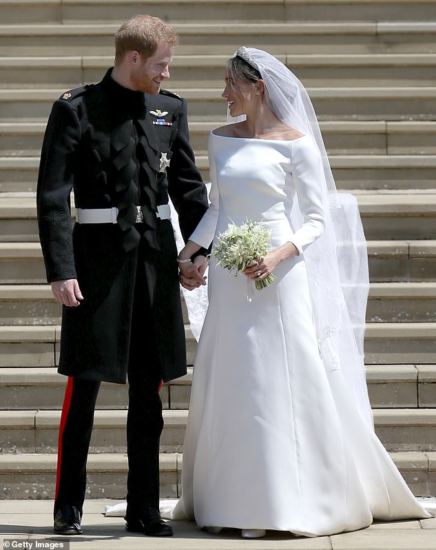 The Duchess of Sussex had a piece of the fabric from her first date sewn into her wedding dress as her 'something blue' - but this is a different outfit to what is written in Harry's memoir, Spare