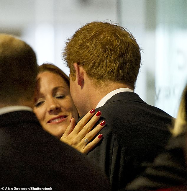 Harry is pictured greeting Natalie in 2011Â at 1 Churchill Place, Canary Wharf, for the seventh annual Global Charity Day