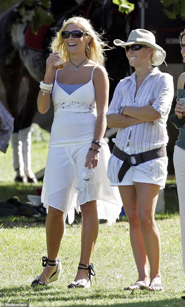 Chelsy and Zara Phillips laugh together at Polo at Tidworth Polo Club, Wiltshire, in July 2006