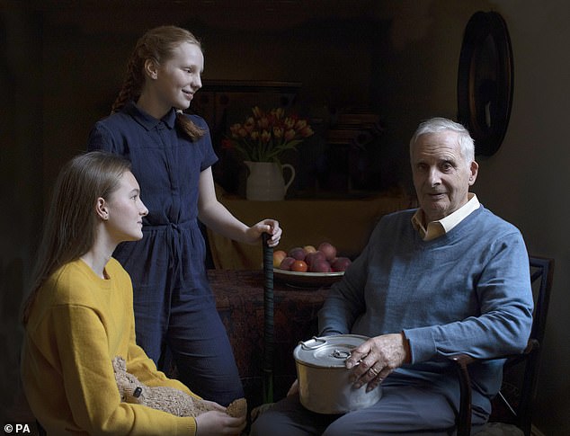 Mr Frank was among only a handful of children to make it out alive from the last of the many concentration camps he was sent to. He was photographed with his granddaughters Maggie and Trixie (pictured)