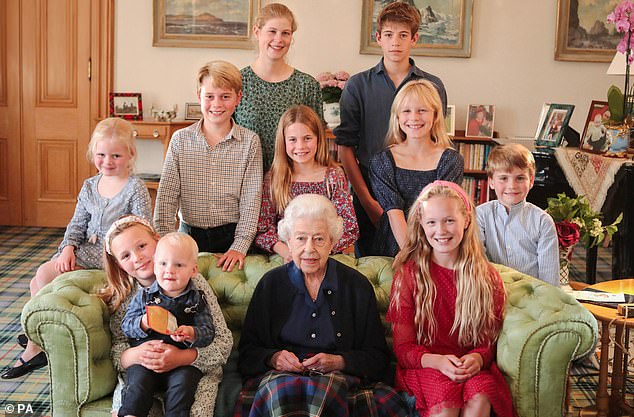 Queen Elizabeth with her great-grandchildren in a photo released to mark her 97th birthday