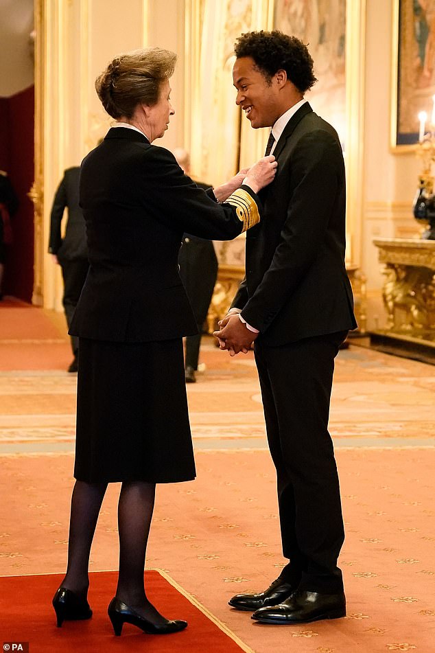 Sheku Kanneh-Mason is made a MBE by the Princess Royal during an investiture ceremony at Windsor Castle -- November, 2021