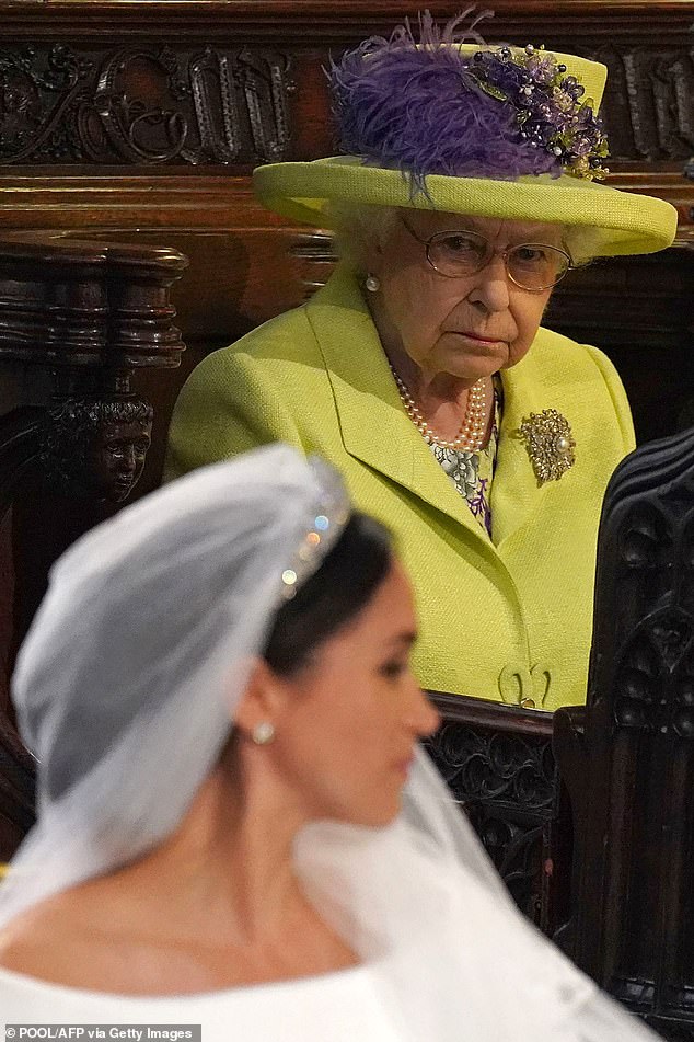 The Queen looks on during the wedding of Prince Harry and Meghan Markle on May 19, 208