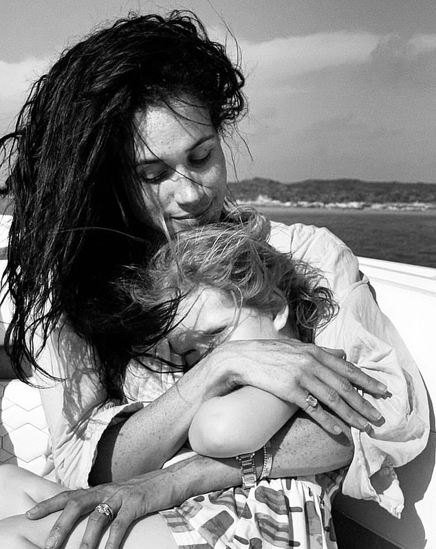 The Duchess of Sussex holding the now-four-year-old Lilibet. The photo was also posted online