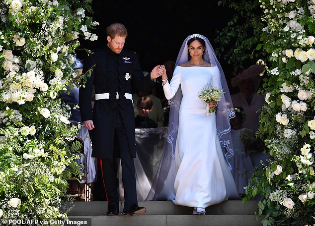 Harry and Meghan emerge from St George's Chapel as husband and wife