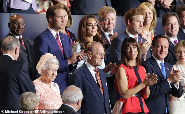 She and her husband Philip, the Duke of Edinburgh, are greeted with thunderous applause. The prime minister at the time, David Cameron, was also in attendance - along with the Queen's grandchildren and the Princess of Wales