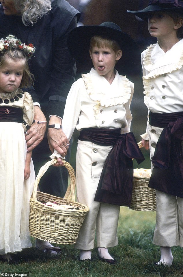 Prince Harry sticks out his tongue as he stands with his cousins as a pageboy at the wedding of his uncle Charles Spencer on September 17, 1989