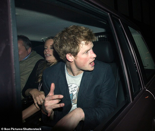 Prince Harry leaves Raffles nightclub in London on March 7, 2009