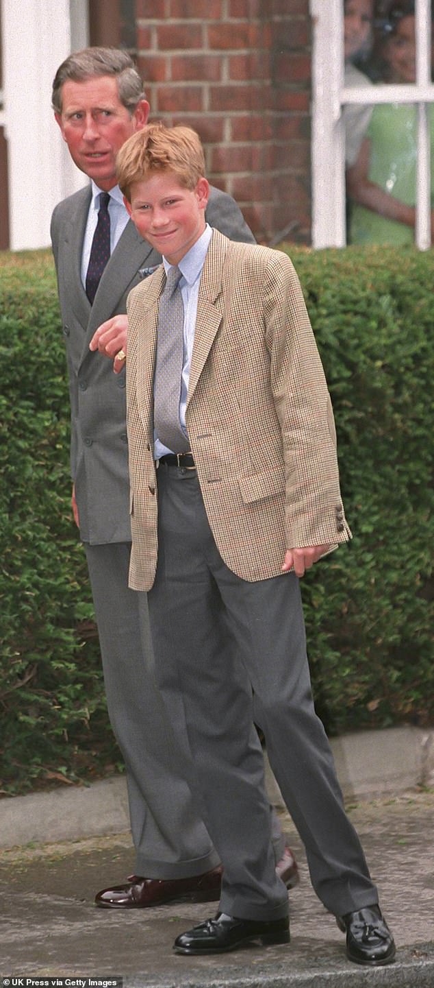 Prince Harry arrives at Eton College with his father Prince Charles to settle in before his first day on September 2, 1998