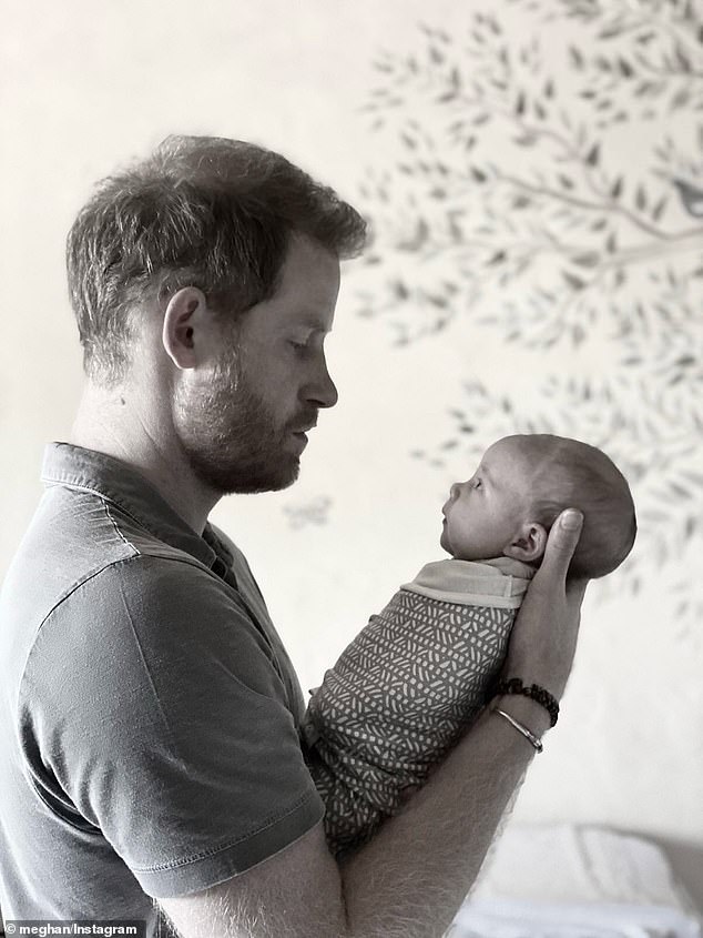 The other image was of Prince Harry holding Lilibet as a baby while they looked at each other