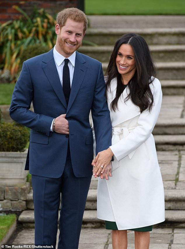 The couple are pictured at their engagement announcement on November 27, 2017