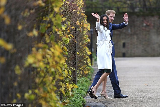 Meghan and Harry attend an official photocall to announce their engagement at The Sunken Gardens at Kensington Palace on November 27, 2017