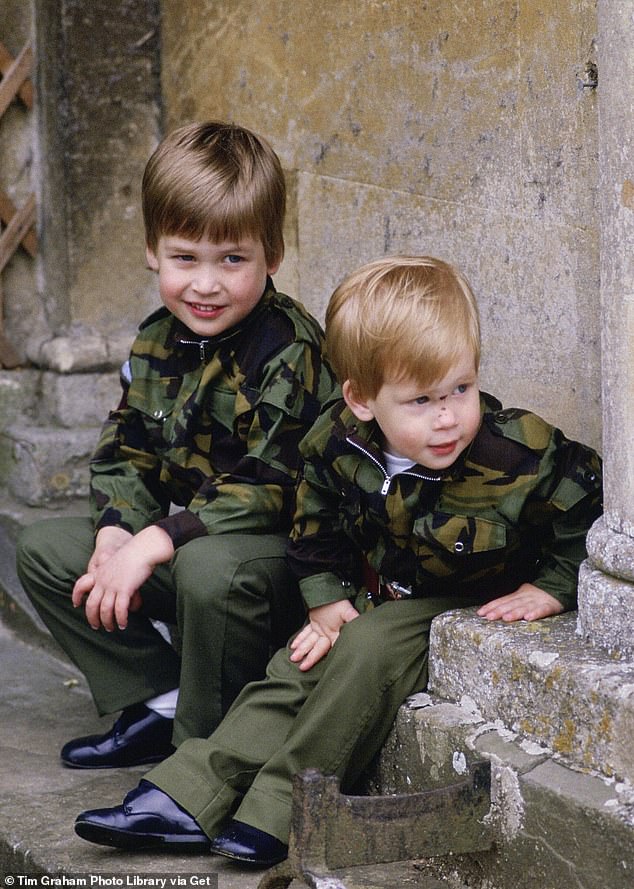 William and Harry sitting together at the steps of Highgrove, wearing military uniforms, in July 1986