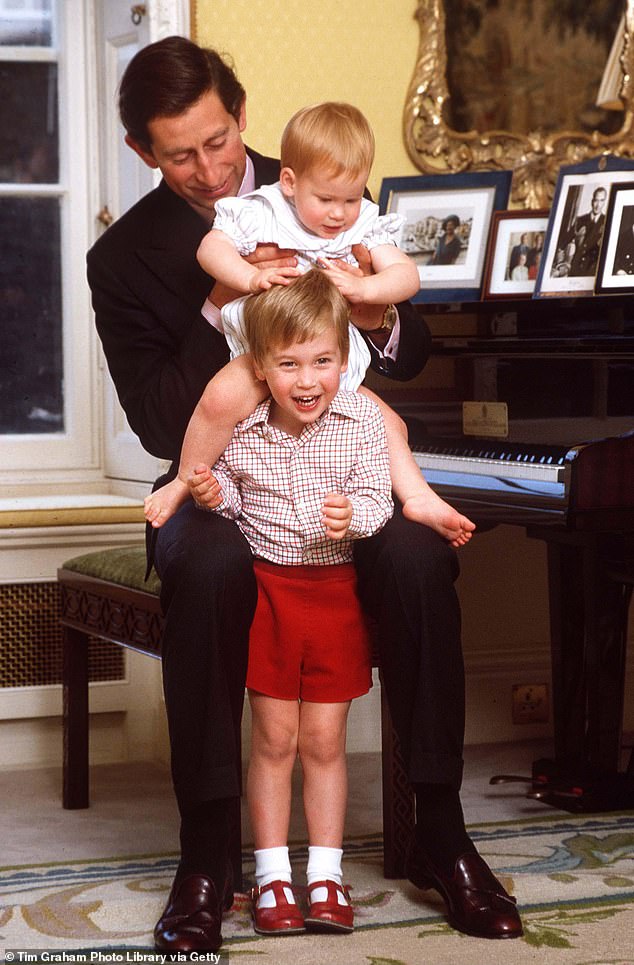 A sweet moment showing young William and Harry with their father