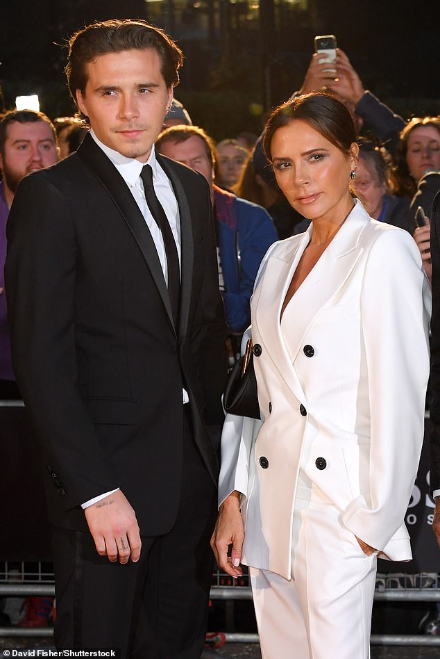 THE WAY THEY WERE: The Beckham family is famously close - and Brooklyn enjoyed a good relationship with his parents before the rumoured feud (pictured with mother Victoria in 2019)