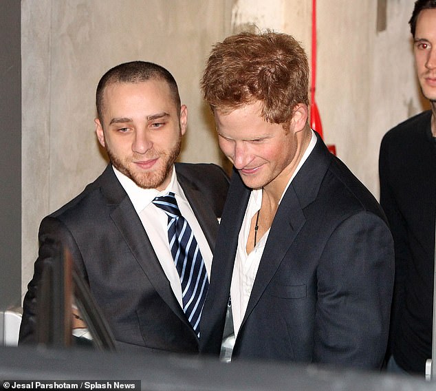 Harry leaves the Arts Club in Mayfair after partying with David Beckham and James Corden