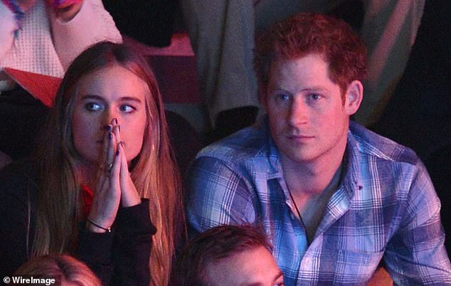 Cressida and Harry eagerly watching the We Day UK event in 2014 at Wembley Arena
