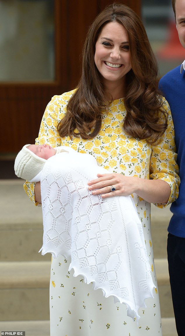 Kate beamed in a floral Jenny Packham dress as she held newborn Princess Charlotte in 2015