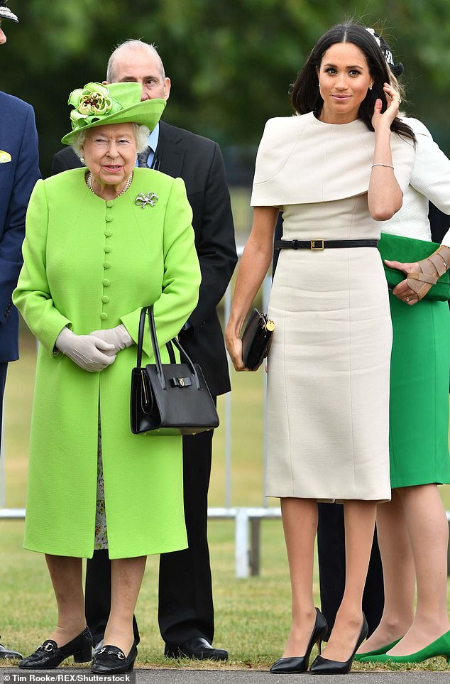 Meghan's creased dress didn't seem to stop her from enjoying her outing with the Queen