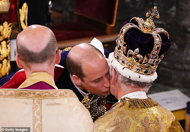 To seal the homage, William kisses Charles on the left cheek