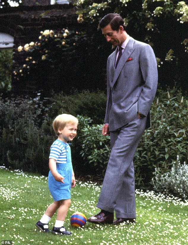 William and Charles play in the garden of Kensington Palace in 1984