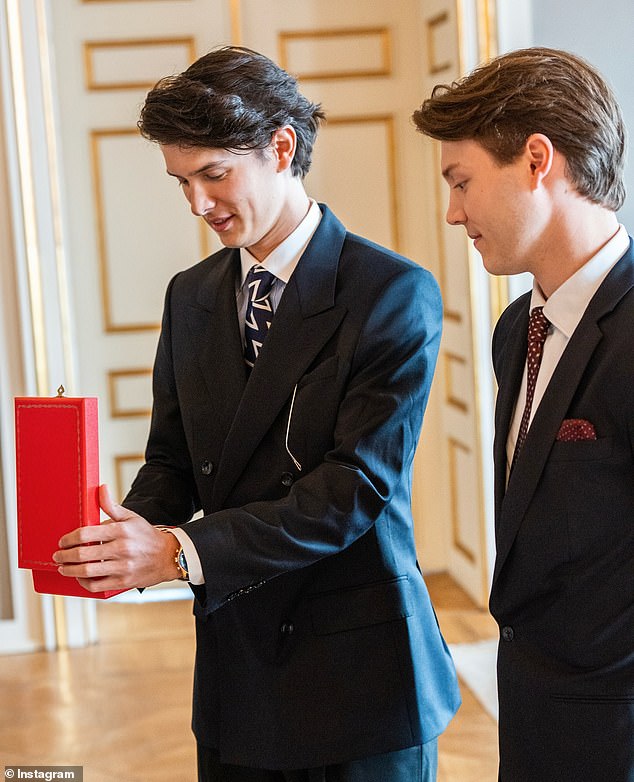 More than two years after their grandmother Queen Margrethe II stripped them of the princely status they had held since their births, their uncle King Frederik awarded Count Nikolai (left) and Count Felix (right) the Grand Cross of the Order of Dannebrog