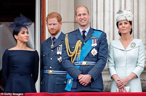 Meghan, Harry, William and Kate watch a flypast to mark the centenary of the Royal Air Force from the balcony of Buckingham Palace in 2018
