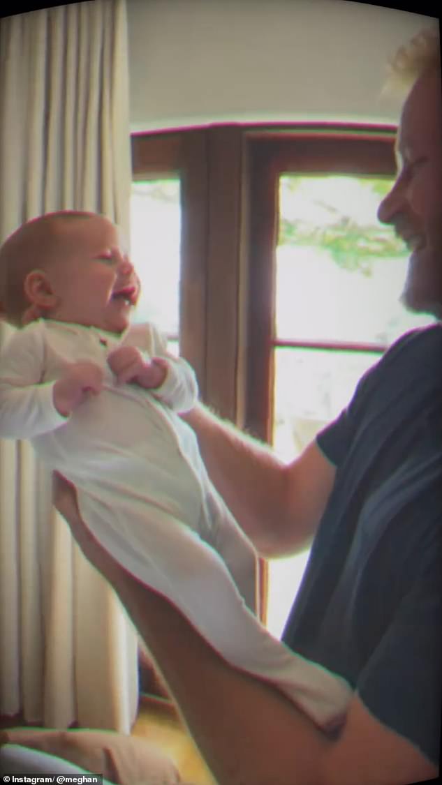 An adorable moment from the Father's Day post showed Harry and his newborn child smiling at each other