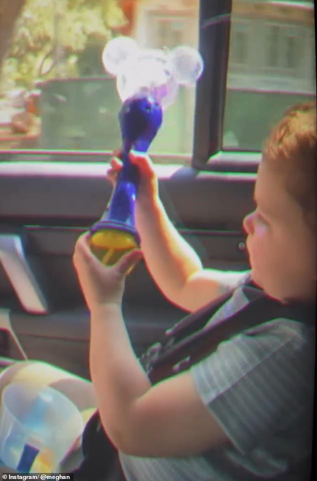Meghan also added a clip of Archie playing with a Minnie Mouse bubble machine while sat in the car