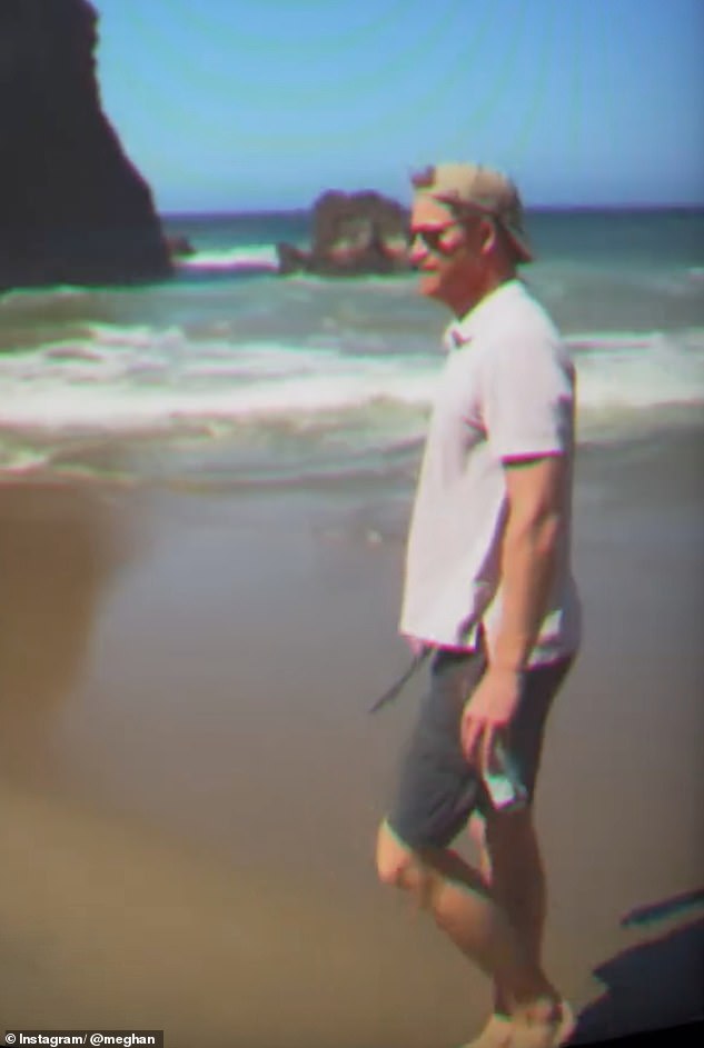 Meghan shared footage of her husband enjoying a stroll along the beach with his family while on holiday