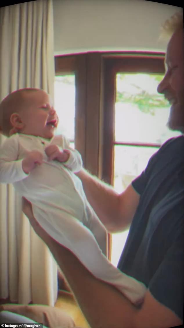An adorable moment from the Father's Day post showed Harry and his newborn child smiling at each other