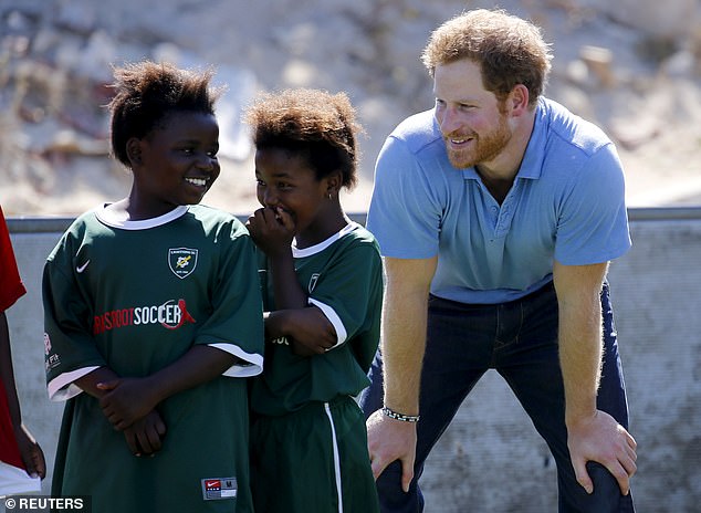 Prince Harry working with the Sentebale charity in 2015. While Meghan has turned her eyes to businesses ventures, Harry has remained focused on his charity work