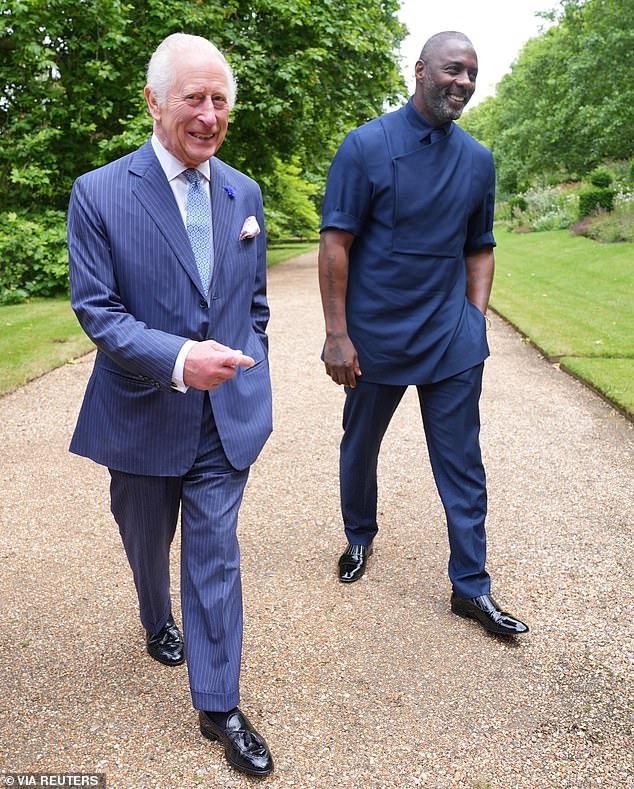 Britain's King Charles and Idris Elba attend an event for The King's Trust to discuss youth opportunity, at St James's Palace