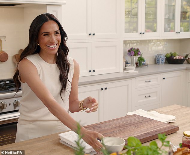 Meghan's own lifestyle and cookery show, With Love, Meghan (pictured), has done somewhat better but received a critical panning